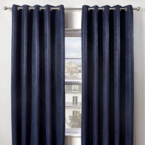 Navy Blue Blackout Eyelet Curtains Hanging In Room