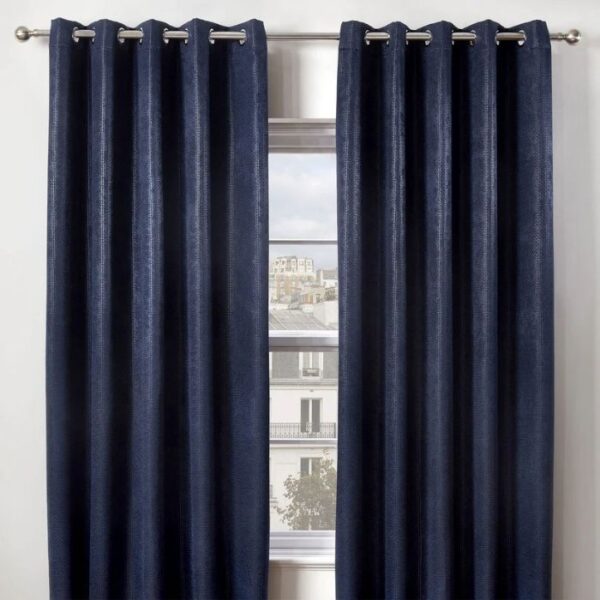 Navy Blue Blackout Eyelet Curtains Hanging In Room