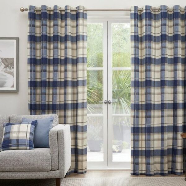 Balmoral Check Navy Blue Eyelet Curtains Hanging In Traditional Room