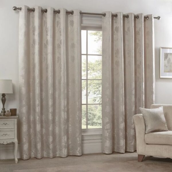 Blossom Cream Eyelet Curtains Hanging In Room