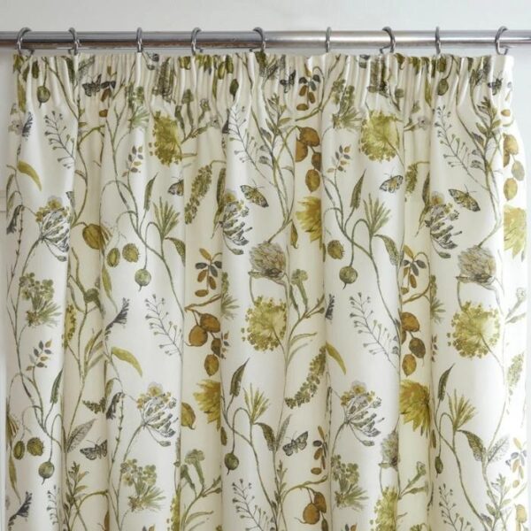 Close-Up Of Green Curtain Fabric And Pleats