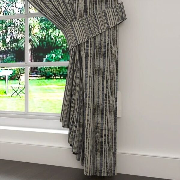 Daylight Filtering Through Blue Pleat Curtains