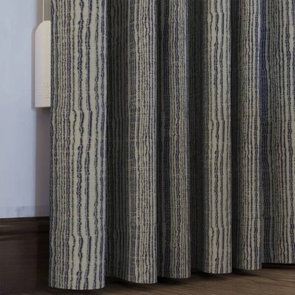 Daylight Filtering Through Blue Ripple-Fold Curtains