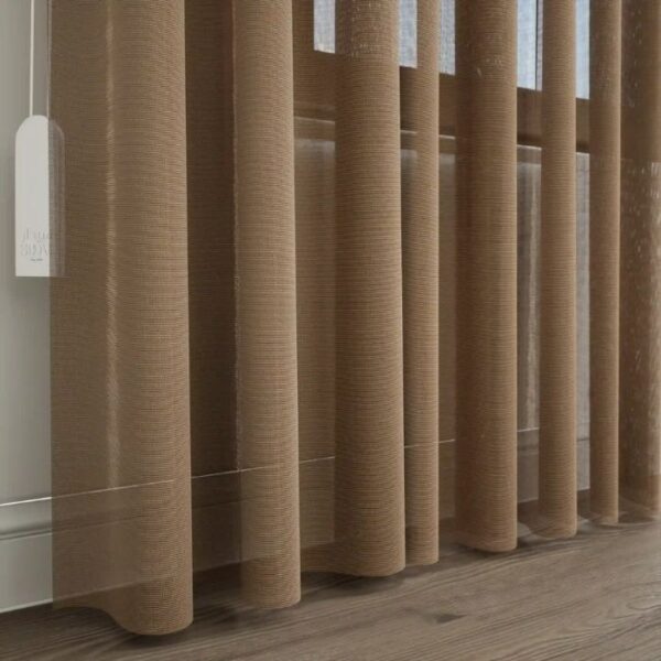 Daylight Filtering Through Dark Brown Pleat Sheer Curtains