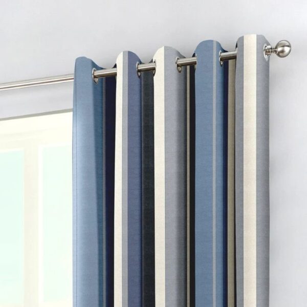 Close-Up Of Blue And White Curtain Stripe Fabric And Eyelets