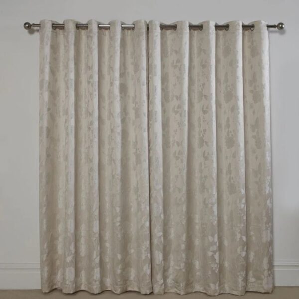 Close-Up of Butterfly and Floral Print on Cream Curtains