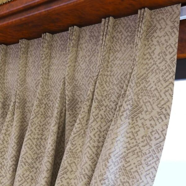 Close-Up Of Ivory Fabric Texture And Pleats