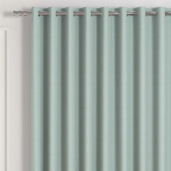 Close-Up Of Light Green Grommet Curtain Fabric Texture
