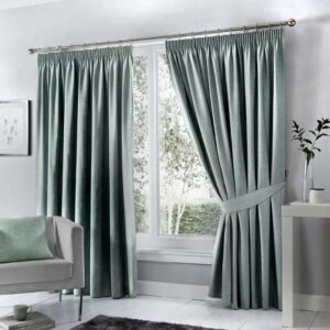 Dijon Duck Egg Pleated Blackout Curtains Hanging In Room
