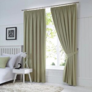 Dijon Green Pencil Pleat Blackout Curtains Hanging In Living Room
