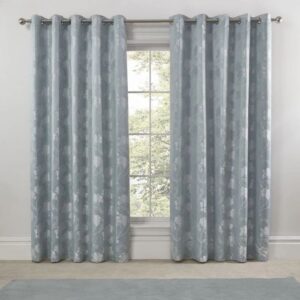 Blossom Duck Egg Eyelet Curtains Hanging In Bright Bedroom