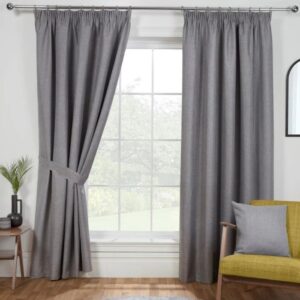 Eclipse Pewter Grey Blackout Pencil Pleat Curtains Hanging In Bedroom