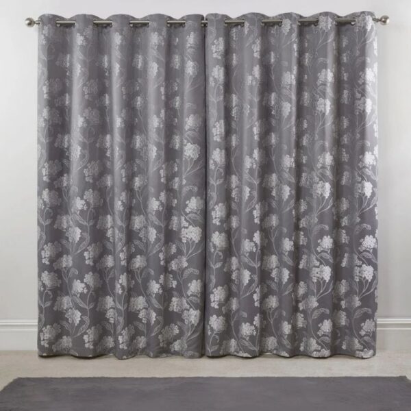 Silver Eyelet Rings On Blossom Lined Curtains