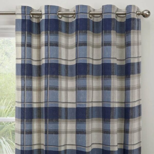 Close-Up Of Balmoral Check Fabric And Eyelet Top