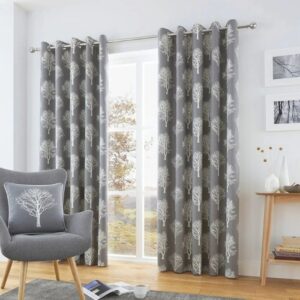 Woodland Trees Charcoal Grey Eyelet Curtains Hanging In Cosy Room