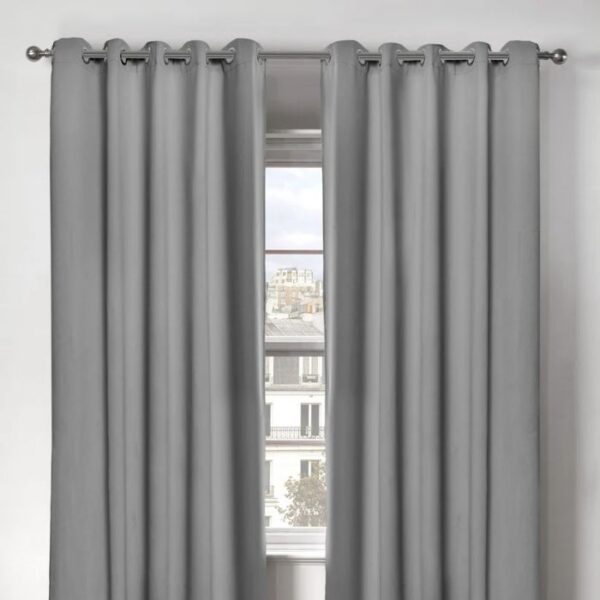 Close-Up Of Curtain Fabric And Chrome Eyelets