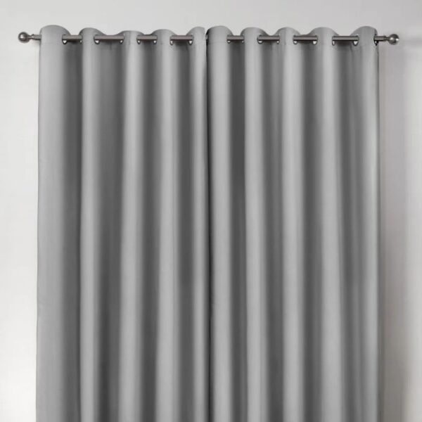 Curtains Fully Drawn Across Window In Daylight
