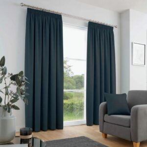 Galaxy Navy Blue Dim Out Pleat Curtains Hanging In Room