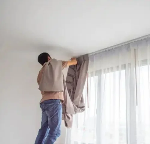 Professional curtain fixing service Dubai