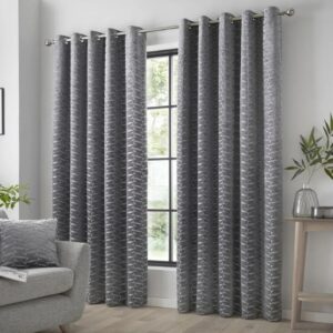 Kendal Charcoal Grey Velvet Eyelet Curtains Hanging In Living Room