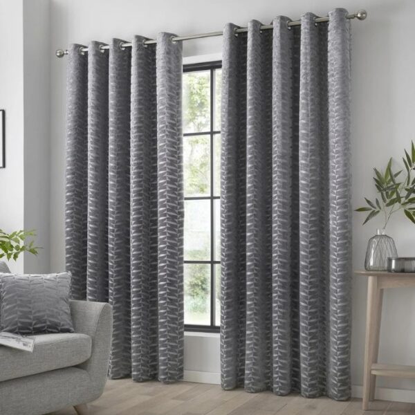 Kendal Charcoal Grey Velvet Eyelet Curtains Hanging In Living Room