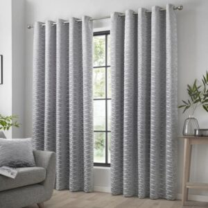 Kendal Silver Grey Velvet Eyelet Curtains Hanging In Room