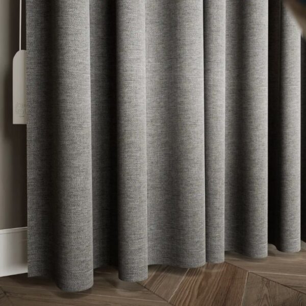 Daylight Filtering Through Silver Pleated Curtains