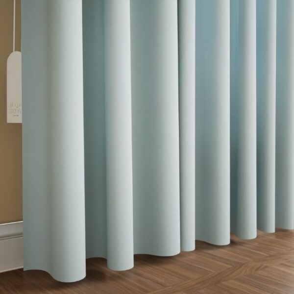Light Blue Curtains Filtering Morning Light