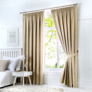 Dijon Natural Pleated Blackout Curtains In Bedroom