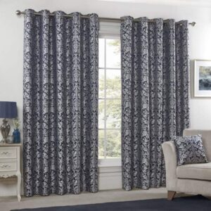 Eden Navy Lined Eyelet Curtains Hanging In Modern Living Room