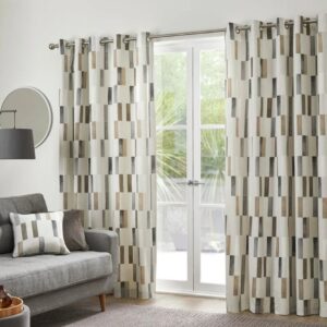 Okland Natural Eyelet Curtains Hanging In Living Room