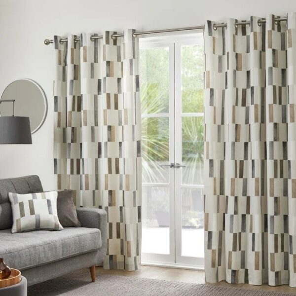 Okland Natural Eyelet Curtains Hanging In Living Room