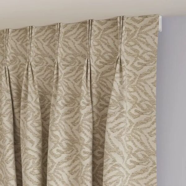 Pinch Pleat Detail On Beige Fabric Curtain