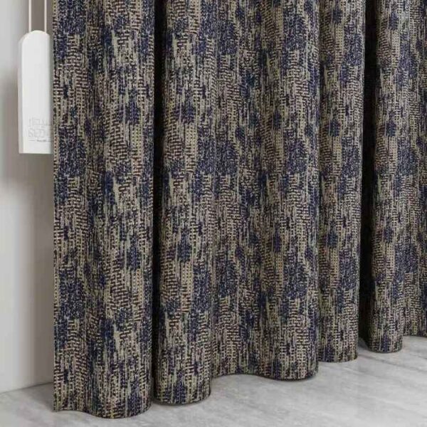 Pinch Pleat Detail On Blue Fabric Curtain