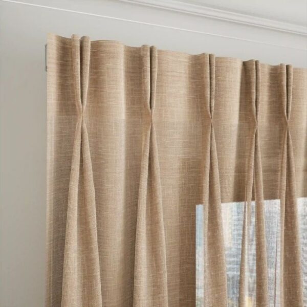 Pinch Pleat Detail On Brown Sheer Curtain