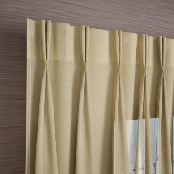 Pinch Pleat Detail On Cream Sheer Curtain