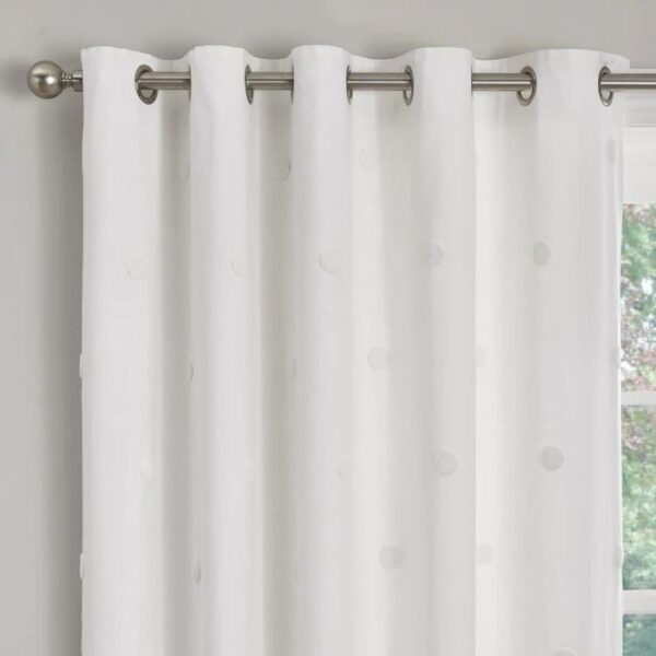 Close-Up Of Polka Dot Pattern On Curtain Fabric