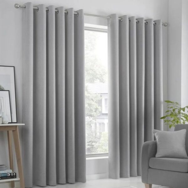 Full-Length Strata Silver Grey Eyelet Curtains in Living Room