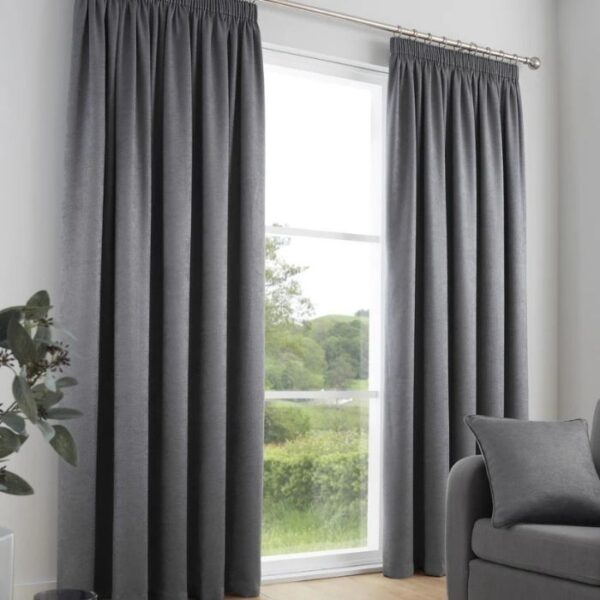 Galaxy Charcoal Grey Dim Out Curtains Hanging In Modern Bedroom
