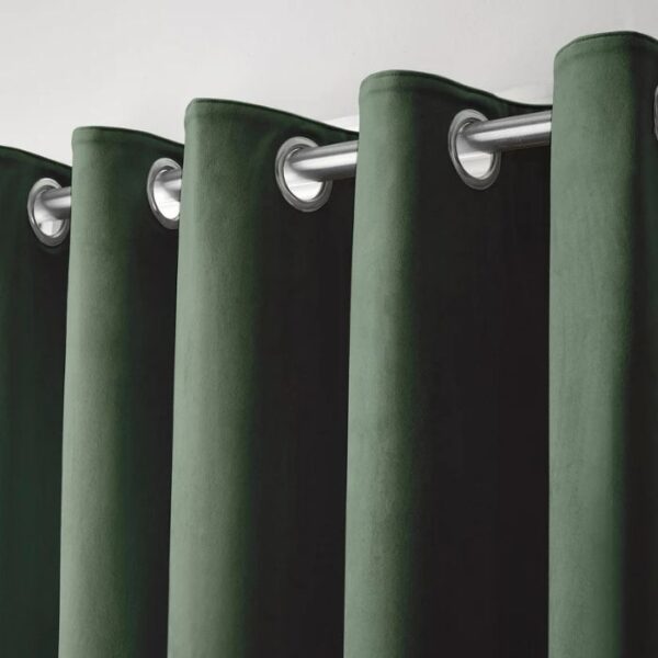 Close-Up Of Bottle Green Crushed Velvet Fabric And Eyelet Detail