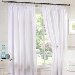 White Lined Pleat Voile Curtains Hanging In Living Room
